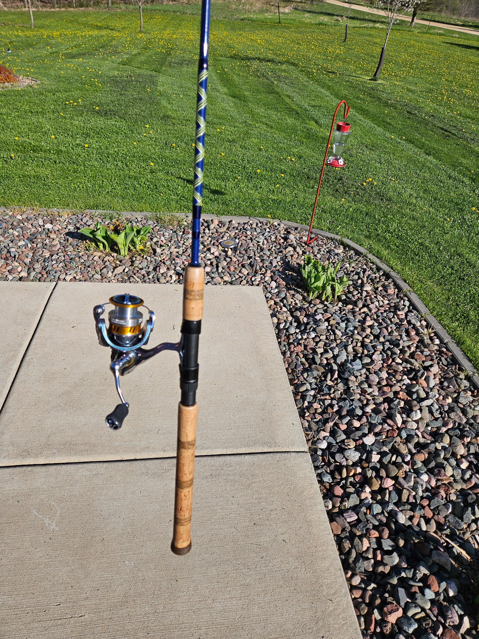 7-foot medium-fast Mud Hole Color Series custom rod with full cork grip, blue burl accent rings, and black American Tackle SSR guides