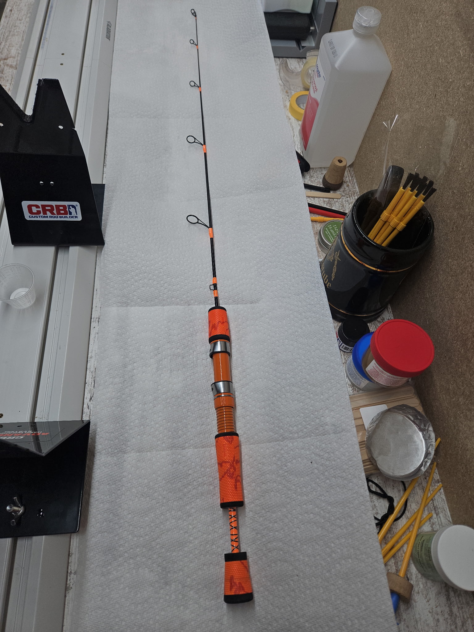 36-inch MHX Precision Power Noodle ice rod with orange Winn grips and black American Tackle SSR guides