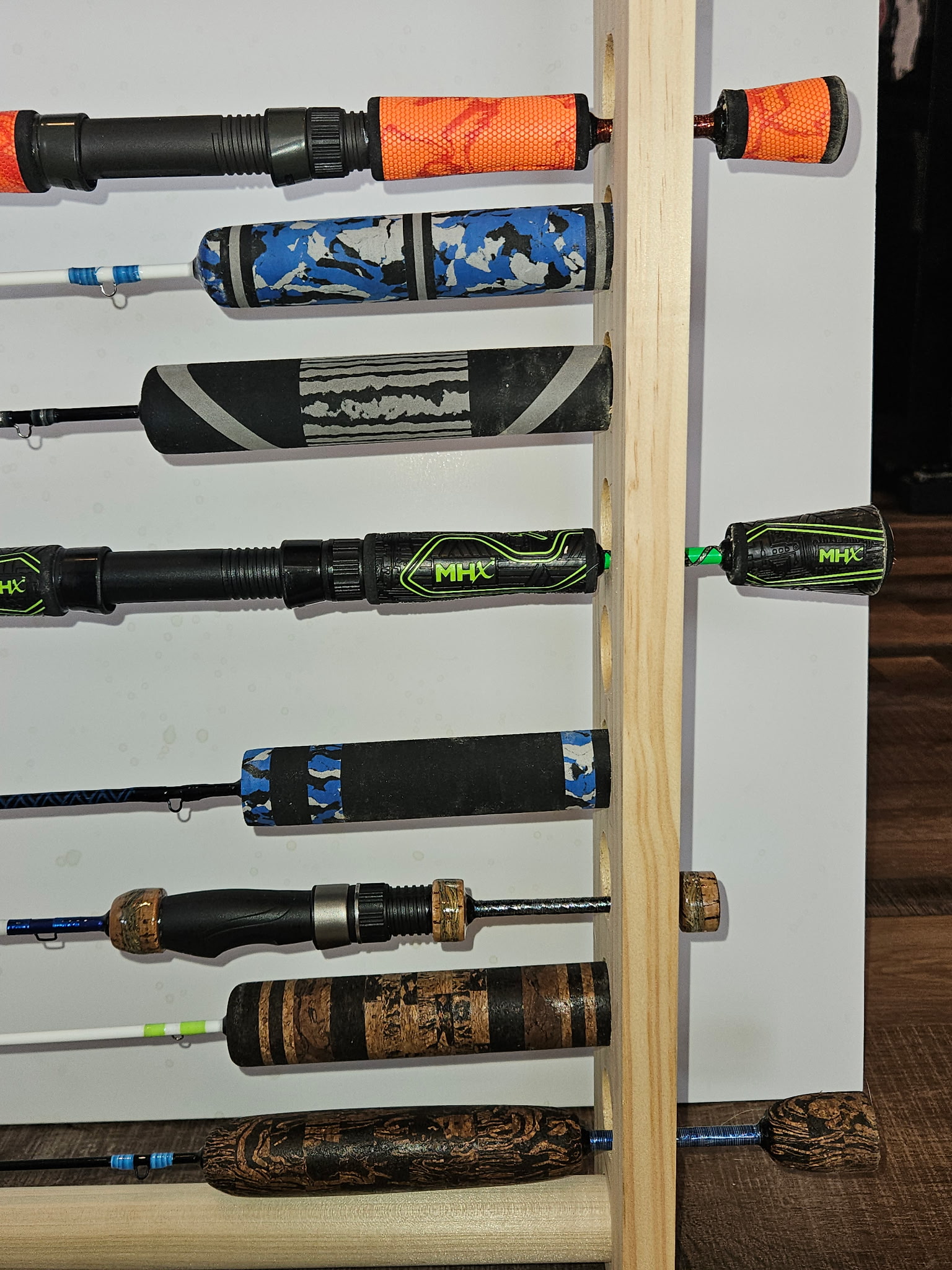 OBG custom ice fishing rod showing cork grip and reel seat assembly detail
